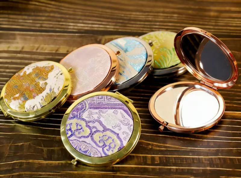 Craft your own elegant mini makeup mirror adorned with exquisite Song brocade, blending traditional Chinese elegance into a lovely daily accessory.